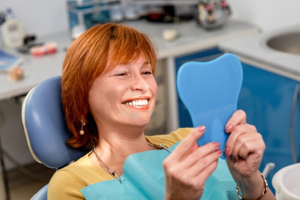 What Your Dentist Wants You To Know About Adjusting To New Dentures